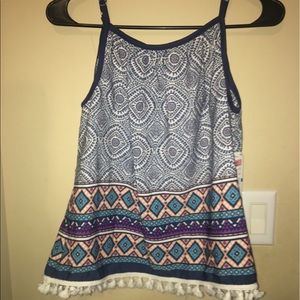 a tank shirt brand is takara girls from dillard’s